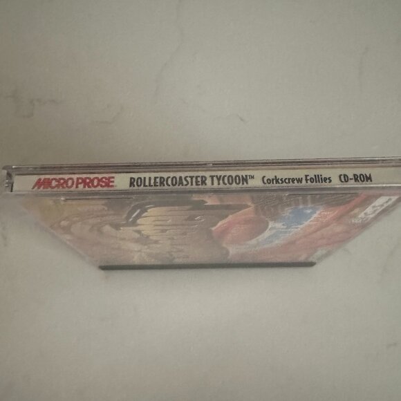 2 for $10 🎁Roller Coaster Tycoon Corkscrew Follies Expansion Pack CD-Rom - Picture 3 of 6